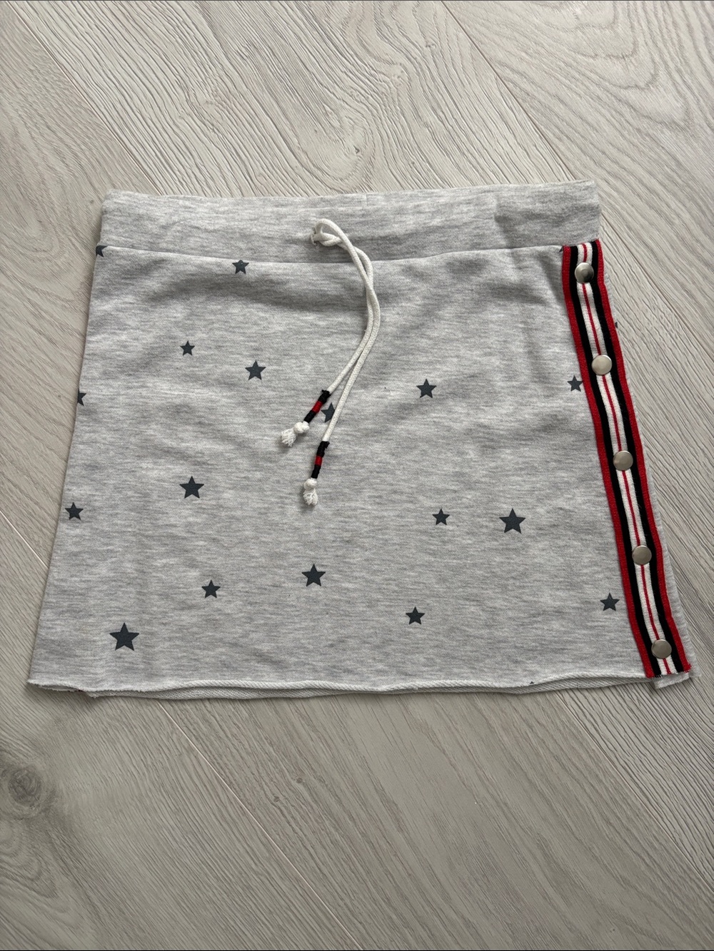 Children’s Gray Star Print Knit Skirt with Red Stripe Side Detail